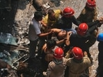 Firefighters rescue a foreign national from a hotel fire in New Delhi, India, Wednesday, June 3, 2026.