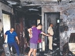 According to chief fire officer (CFO) Rahul Pal, the fire started in the drawing room while the family was sleeping in one of the other rooms and quickly engulfed the flat, leaving them no safe way to leave. (Sakib Ali/HT Photo)