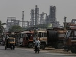 Oil tankers outside a refinery operated by Bharat Petroleum in Mumbai.(Bloomberg file)