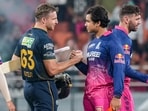 Gujarat Titans' Jos Buttler greets Vaibhav Sooryavanshi after winning the Indian Premier League (IPL) 2026 Qualifier 2 T20 cricket match
