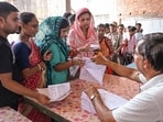 People collect forms for the Annapurna Yojana, under which women beneficiaries will get <span class='webrupee'>₹</span>3,000 per month as financial assistance, in Nadia, West Bengal. People collect forms for the Annapurna Yojana, under which women beneficiaries will get <span class='webrupee'>₹</span>3,000 per month as financial assistance, in Nadia, West Bengal.