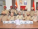 Punjab Police busted an illegal arms and drug trafficking module allegedly linked to handlers across the International Border, arresting two persons and recovering 2.225 kg of heroin, six sophisticated foreign-made pistols and 12 live cartridges from their possession. Punjab Police busted an illegal arms and drug trafficking module allegedly linked to handlers across the International Border, arresting two persons and recovering 2.225 kg of heroin, six sophisticated foreign-made pistols and 12 live cartridges from their possession.