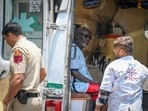 Relatives moved between hospitals seeking missing people, while police personnel injured during rescue operations were discharged. (Sanchit Khanna/HT)
