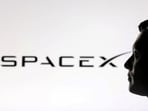 FILE PHOTO: A 3D-printed miniature model of Elon Musk and a SpaceX logo are seen in this illustration created on January 23, 2025. REUTERS/Dado Ruvic/File Photo