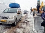 Vehicles pass from Zoji La Pass. (ANI Video Grab)