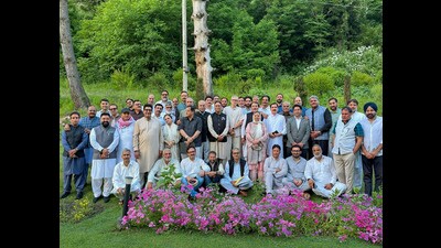 National Conference legislators, led by chief minister Omar Abdullah, along with Cabinet Ministers, MPs, and MLAs, during a group photograph after a party meeting, in Srinagar on Wednesday. (ANI)