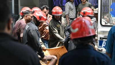 A hospital official from AIIMS Traum Centre told HT that 13 people were brought in for treatment following the fire incident. Of them, three had sustained injuries after jumping from the upper floors of the building, while the remaining 10 were Delhi Police personnel involved in the rescue operation. (Sanchit Khanna/HT Photo)) A hospital official from AIIMS Traum Centre told HT that 13 people were brought in for treatment following the fire incident. Of them, three had sustained injuries after jumping from the upper floors of the building, while the remaining 10 were Delhi Police personnel involved in the rescue operation. (Sanchit Khanna/HT Photo))