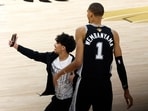 The interruption halted play for roughly a minute as referees and arena staff restored order.