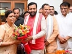 Haryana CM Nayab Singh Saini with new state BJP chief Archana Gupta on Wednesday. (HT Photo)