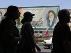Iranian women walk through the Enghelab Square in Tehran on June 3, 2026. 