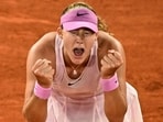 Mirra Andreeva celebrates after winning against Ukraine's Marta Kostyuk. (AFP)