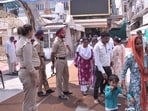 Punjab Police personnel conducting checks at Durgiana Temple in Amritsar following the bomb threat email on Thursday. (Sameer Sehgal/HT) Punjab Police personnel conducting checks at Durgiana Temple in Amritsar following the bomb threat email on Thursday. (Sameer Sehgal/HT)