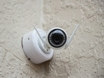AI-powered security cameras are reducing false alerts and helping homeowners focus on real security threats. (Pexels)