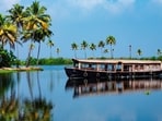 Wake up to the sound of waves and watch a tangerine sun float over Kerala’s second-largest lake—you’re at Club Mahindra Ashtamudi.(Club Mahindra)