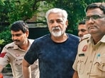 Lovkesh Bajaj, owner of the Hauz Rani B&B brought to the Malviya Nagar police station on Thursday, June 4, 2026. (PTI)