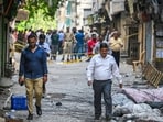 Officials at the spot amid investigation after the south Delhi B&B fire. (RAJ K RAJ /HT PHOTO)