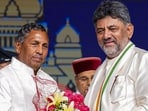 Newly-sworn Karnataka chief minister DK Shivakumar felicitates Congress MLA KH Muniyappa after the latter takes oath as the state Cabinet Minister on June 3