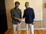 Tamil Nadu chief minister Vijay (L) with Congress's Praveen Chakrvarty (R)