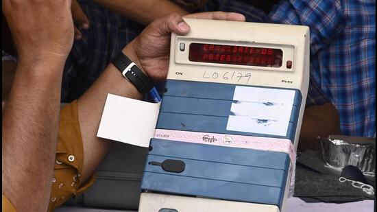 Lucknow, India-May 13, 2023: Election staff members open an electronic voting machine (EVM) to count votes for the result of Local bodies' election inside a vote counting center at Ramabai Rally Ground in Lucknow, Uttar Pradesh India on Saturday, May 13, 2023. (Photo by Deepak Gupta Hindustan Times)