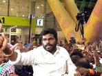 A large number of supporters of K. Annamalai welcome him at Chennai airport as he returns to the city after announcing his resignation from the BJP on Friday. 