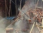 An illegal building being demolished in Ludhiana on Saturday. (HT Photo) An illegal building being demolished in Ludhiana on Saturday. (HT Photo)