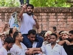 Abhijeet Dipke, center, founder of the Cockroach Janta Party addresses his supporters during a protest rally in New Delhi, India, Saturday, June 6, 2026. (AP Photo) Abhijeet Dipke, center, founder of the Cockroach Janta Party addresses his supporters during a protest rally in New Delhi, India, Saturday, June 6, 2026. (AP Photo)
