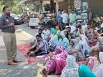 The vicitm’s family members along with farmer organisations and Left union activists staged a protest outside the Mehatpur police station on Saturday, seeking criminal action against the SHO and his subordinates who accompanied him during the raid. (HT Photo)