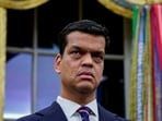 Sriram Krishnan, Senior White House Policy Advisor on Artificial Intelligence, listens prior to US President Donald Trump signing an executive order on AI in the Oval Office at the White House in Washington. 
