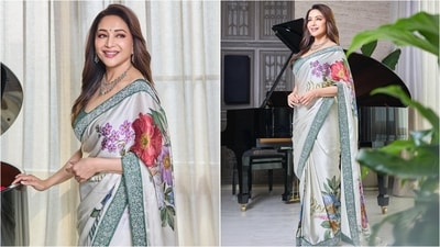 In another look, Madhuri rocked a grey silk saree adorned with colourful floral prints. She elevated the ensemble with luxe diamond jewellery. (Instagram/@madhuridixitnene) In another look, Madhuri rocked a grey silk saree adorned with colourful floral prints. She elevated the ensemble with luxe diamond jewellery. (Instagram/@madhuridixitnene)