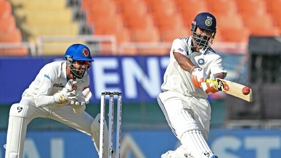 Rishabh Pant counterattacked in typical fashion, taking spinner Abdul Malik apart for three sixes in a single over before reaching his 19th half-century in Test cricket.(AFP)