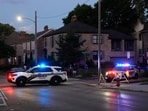 Toledo festival shooting:: Police stand near where multiple people were shot at a community festival at the Agnes Reynolds Jackson Arboretum Saturday, June 6, 2026, in Toledo, Ohio. (AP/PTI) 