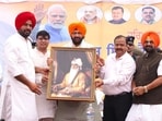 Haryana Chief Minister Nayab Singh Saini during a public meeting with the people of Punjab at Dhuri, in Sangrur on Sunday. (ANI)