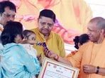 Uttar Pradesh chief minister Yogi Adityanath at a public function in Gonda on Saturday. (ANI Photo)