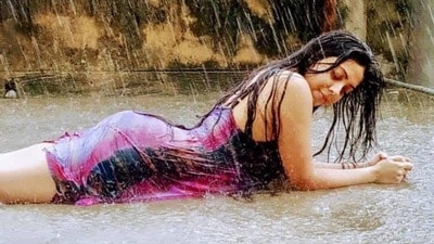 স্বল্প পোশাকে ছাদে শুয়ে জলকেলি শ্রীময়ীর