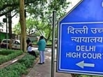 The DHCBA contended that the activist had uploaded a series of videos on social media accusing the judge of being responsible for the building collapse.
