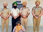 The accused in the custody of police in Ludhiana on Monday. (HT Photo)