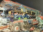 Three pilgrims were killed and 18 injured after a bus carrying 38 pilgrims from Andhra Pradesh rammed into an iron rods-laden truck parked at a roadside eatery on NH-19 under Mufassil police station area of Aurangabad district early on Monday. (HT photo)