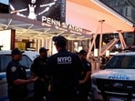 NYPD police officers are seen outside Penn Station in New York on June 7, 2026. Five people were wounded Sunday in a stabbing at New York's Penn Station, according to the city fire department, which said all victims were transported to hospital and the attacker was "in custody.". (Photo by John Lamparski / AFP)