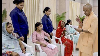 Chief minister Yogi Adityanath listens to the concerns of people during ‘Janata Darshan’, at his official residence, in Lucknow, on Monday. (PTI Photo) Chief minister Yogi Adityanath listens to the concerns of people during ‘Janata Darshan’, at his official residence, in Lucknow, on Monday. (PTI Photo)