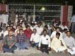 Congress party workers sit in front of the Election Commission's office for a dharna after the Congress Rajya Sabha candidate Meenakshi Natrajan's nomination rejected by the Election Commission, in Bhopal. (ANI Photo)