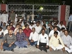 Congress party workers sit in front of the Election Commission's office for a dharna after the Congress Rajya Sabha candidate Meenakshi Natrajan's nomination rejected by the Election Commission, in Bhopal. 