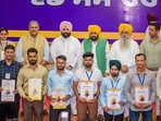 Chief minister Bhagwant Mann after giving appointment letter to newly appointed youth in Chandigarh on Monday. Also seen in picture are ministers Harjot Singh Bains and Gurmeet Singh Khudian. (Sourced)