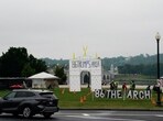 A car drives by a protest site with a large display opposing Donald Trump's proposed 250-foot 'Triumphal Arch', near the Arlington Memorial Bridge, in Washington, DC, on May 24.