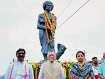 Jharkhand Governor Santosh Gangwar, CM Hemant Soren and his wife MLA Kalpana Soren after paying tributes to Birsa Munda in Ranchi on Tuesday (HT PHOTO)