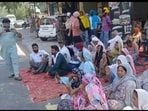 Lovepreet Singh kin protesting outside Mehatpur police station on Saturday evening. (HT File)