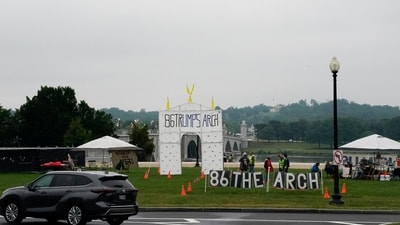 A car drives by a protest site with a large display opposing Donald Trump's proposed 250-foot 'Triumphal Arch', near the Arlington Memorial Bridge, in Washington, DC, on May 24. (Reuters)