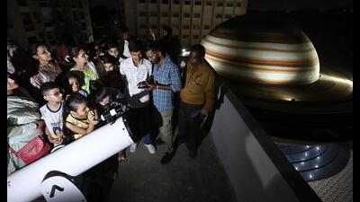 Skywatchers observe rare celestial event as two brightest planets appeared just 1.6 degrees apart above the western horizon shortly after sunset in Lucknow on June 9. (HT photo)