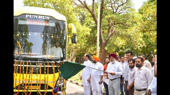 Punjab transport minister Harpal Singh Cheema flagging off five new PUNBUS super integral coach buses in Chandigarh on Tuesday. (HT)