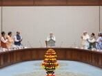 Prime Minister Narendra Modi acknowledges applause from Union Cabinet ministers. Prime Minister Narendra Modi acknowledges applause from Union Cabinet ministers.