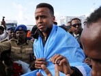 Somali referee Omar Abdulkadir Artan is received as he arrives at the Aden Abdulle Osman International Airport in Mogadishu.